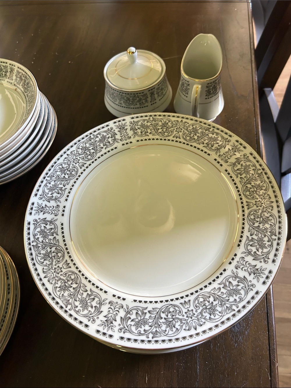 Wilshire House Fine China 8 piece place setting. Missing 1 coffee cup